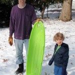 Evan and Dad sledding