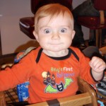 Wyatt in a high chair