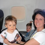 Wyatt and Evan and Mom on the plane